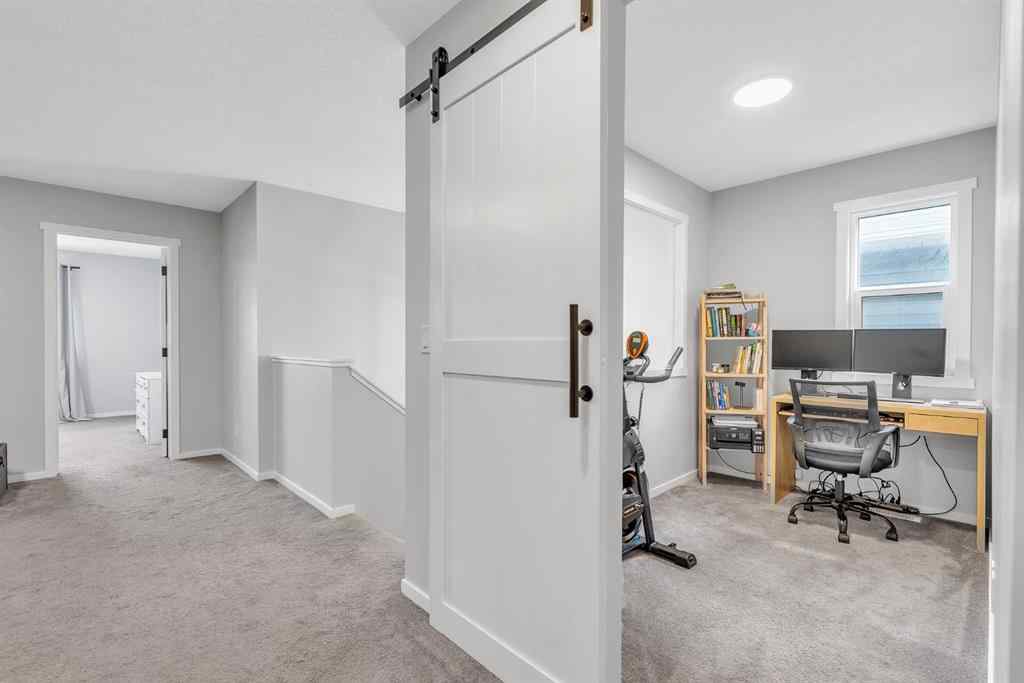 MLS® A2262302 - 98 Lucas Crescent NW in Livingston Calgary, Residential