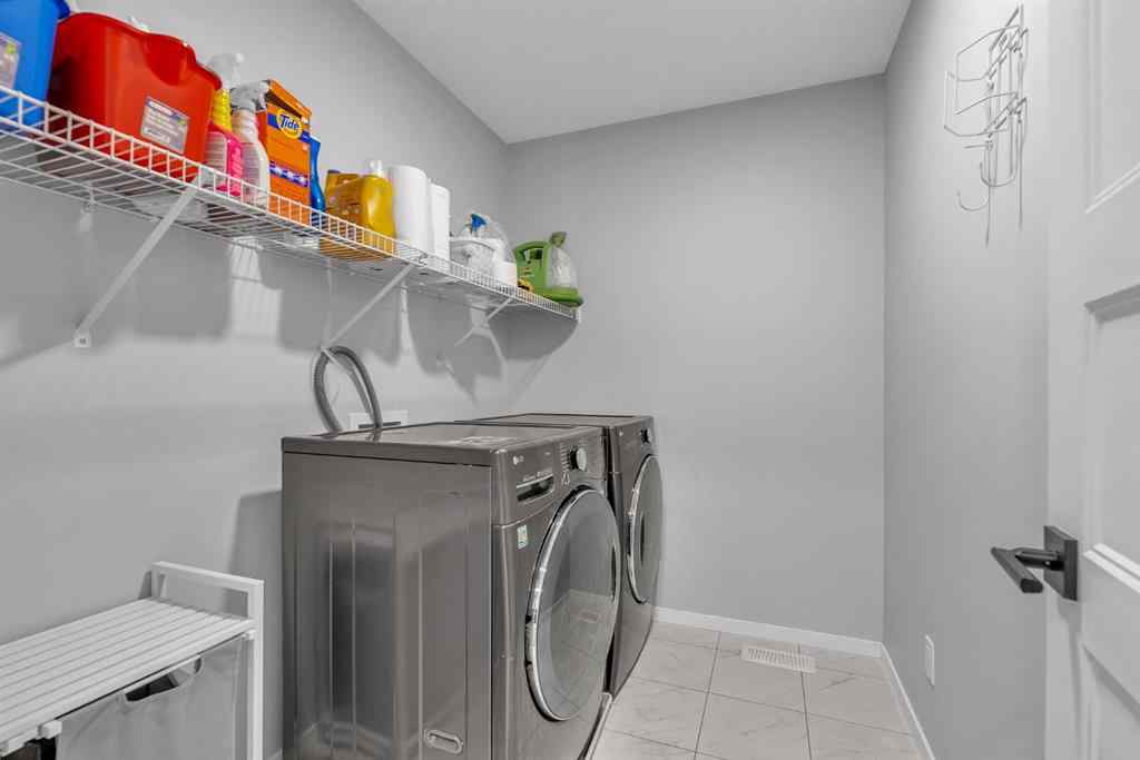 MLS® A2262302 - 98 Lucas Crescent NW in Livingston Calgary, Residential