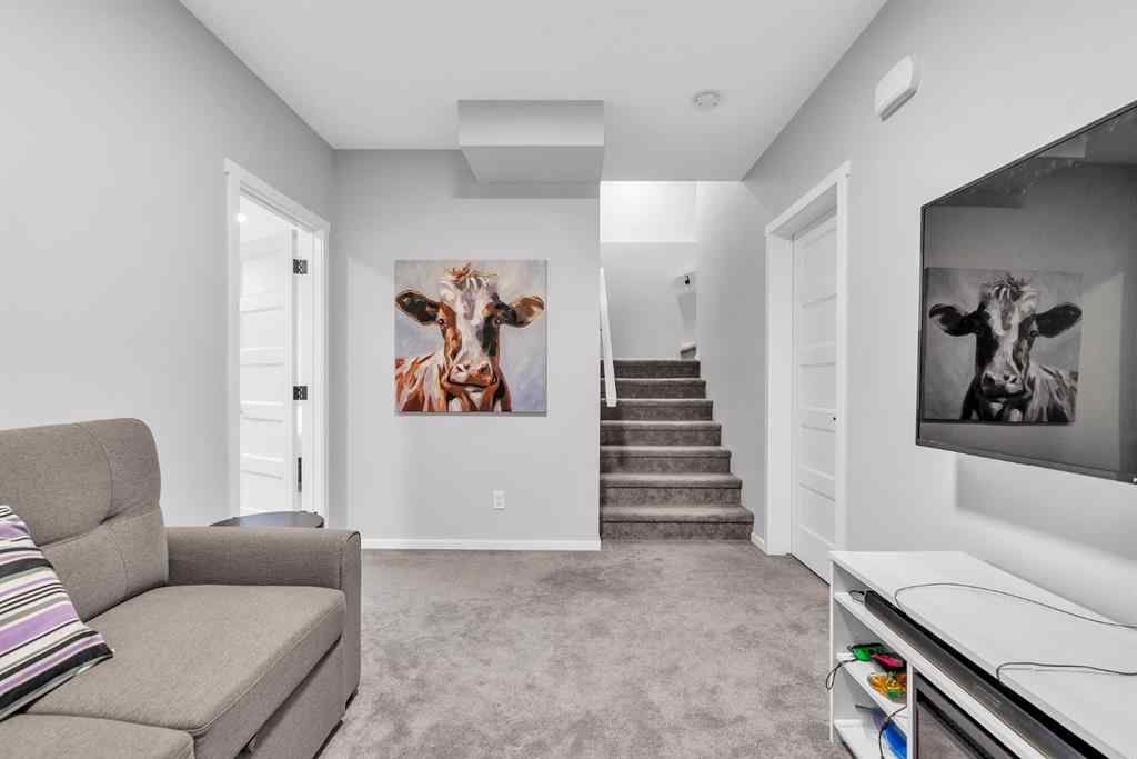 MLS® A2262302 - 98 Lucas Crescent NW in Livingston Calgary, Residential