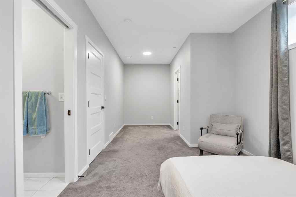 MLS® A2262302 - 98 Lucas Crescent NW in Livingston Calgary, Residential