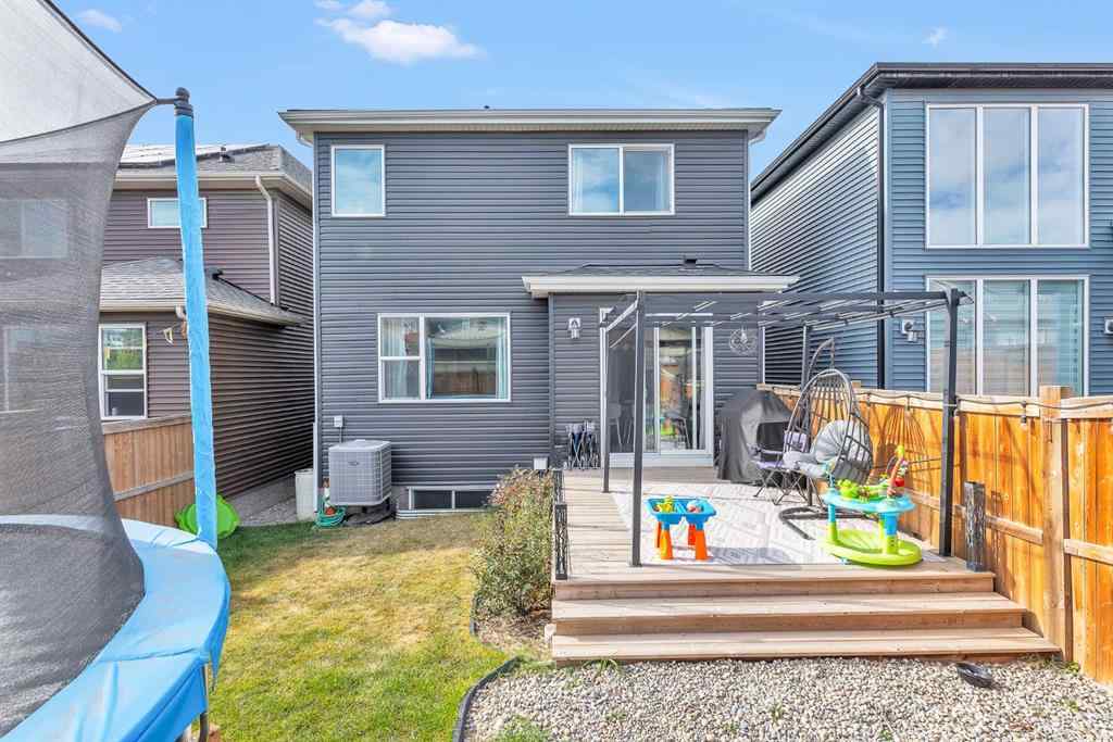 MLS® A2262302 - 98 Lucas Crescent NW in Livingston Calgary, Residential