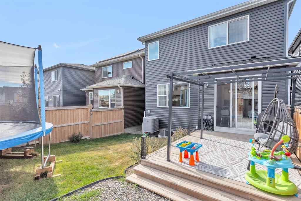 MLS® A2262302 - 98 Lucas Crescent NW in Livingston Calgary, Residential