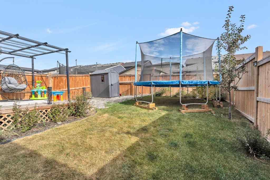 MLS® A2262302 - 98 Lucas Crescent NW in Livingston Calgary, Residential