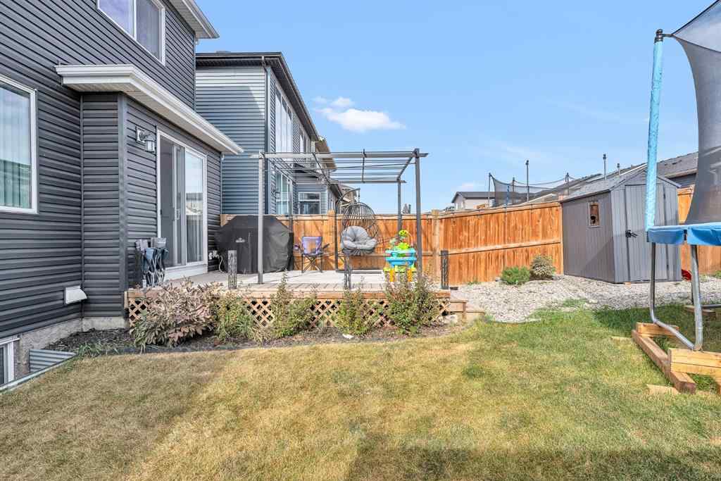 MLS® A2262302 - 98 Lucas Crescent NW in Livingston Calgary, Residential