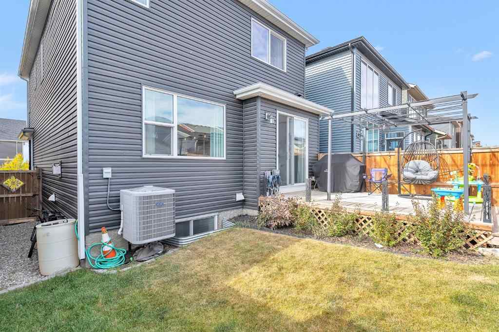 MLS® A2262302 - 98 Lucas Crescent NW in Livingston Calgary, Residential