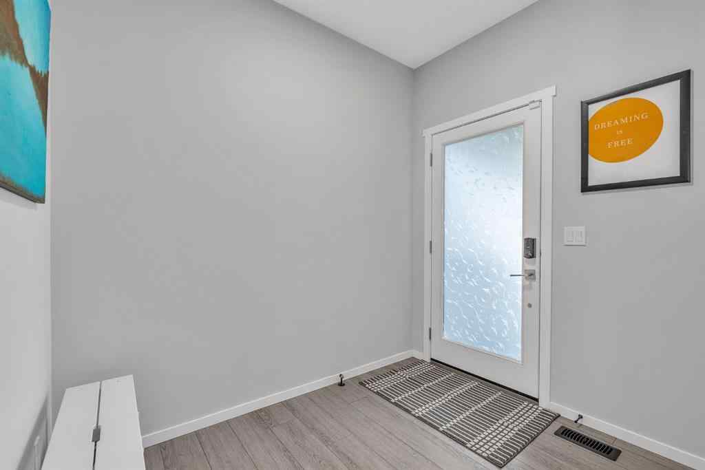 MLS® A2262302 - 98 Lucas Crescent NW in Livingston Calgary, Residential