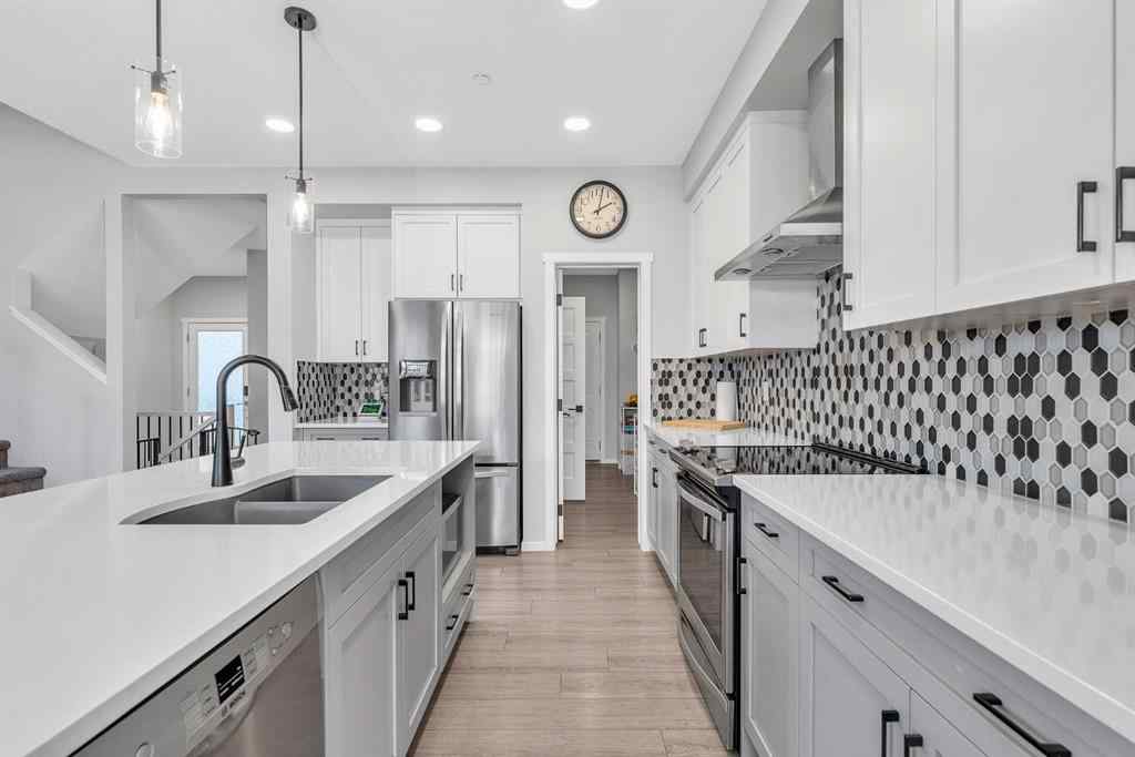 MLS® A2262302 - 98 Lucas Crescent NW in Livingston Calgary, Residential