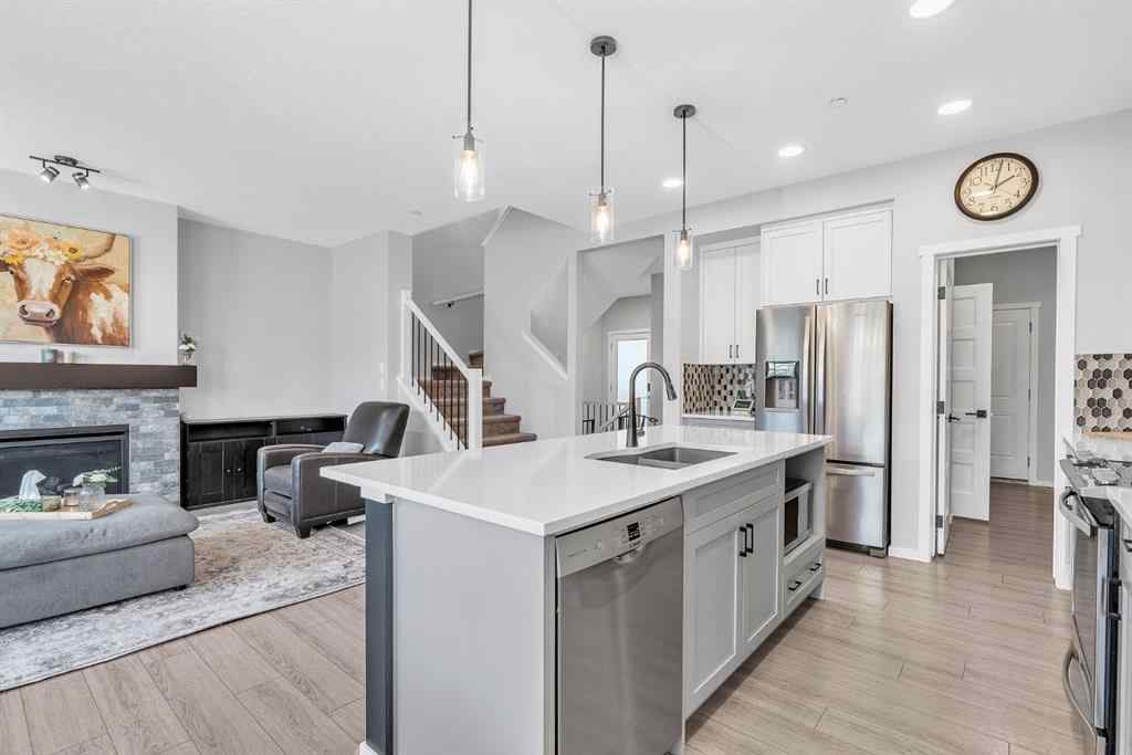 MLS® A2262302 - 98 Lucas Crescent NW in Livingston Calgary, Residential