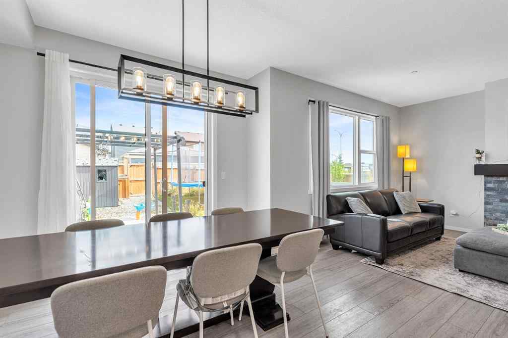 MLS® A2262302 - 98 Lucas Crescent NW in Livingston Calgary, Residential