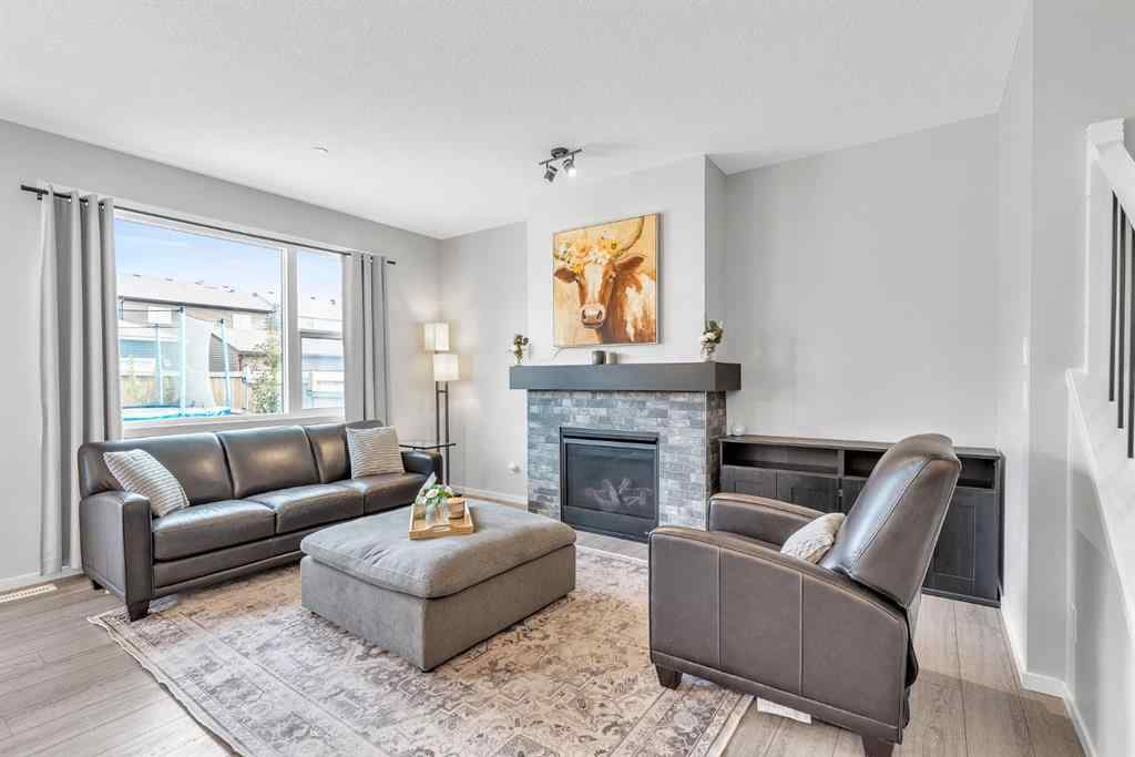 MLS® A2262302 - 98 Lucas Crescent NW in Livingston Calgary, Residential