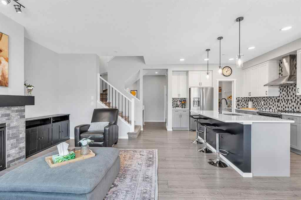 MLS® A2262302 - 98 Lucas Crescent NW in Livingston Calgary, Residential