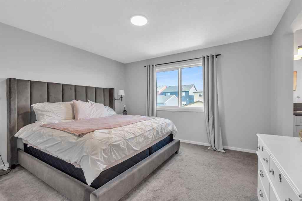 MLS® A2262302 - 98 Lucas Crescent NW in Livingston Calgary, Residential