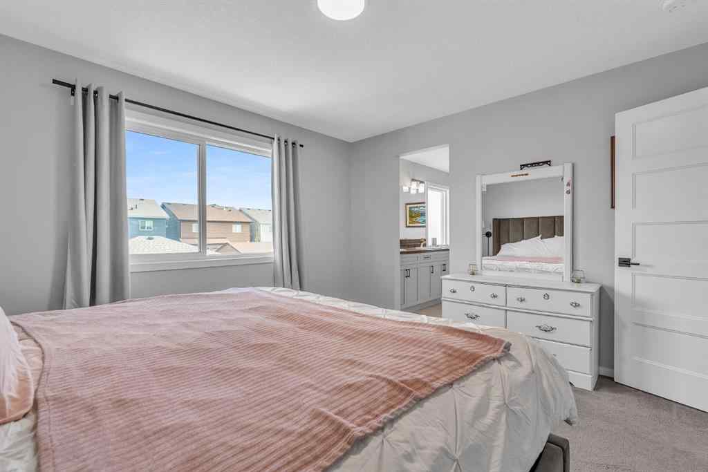 MLS® A2262302 - 98 Lucas Crescent NW in Livingston Calgary, Residential