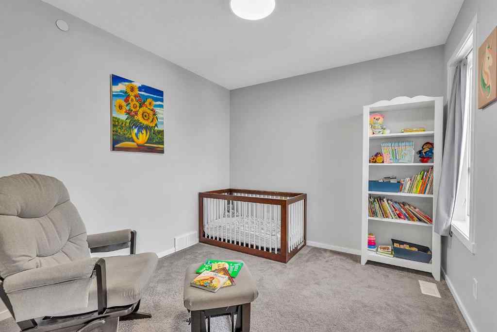 MLS® A2262302 - 98 Lucas Crescent NW in Livingston Calgary, Residential