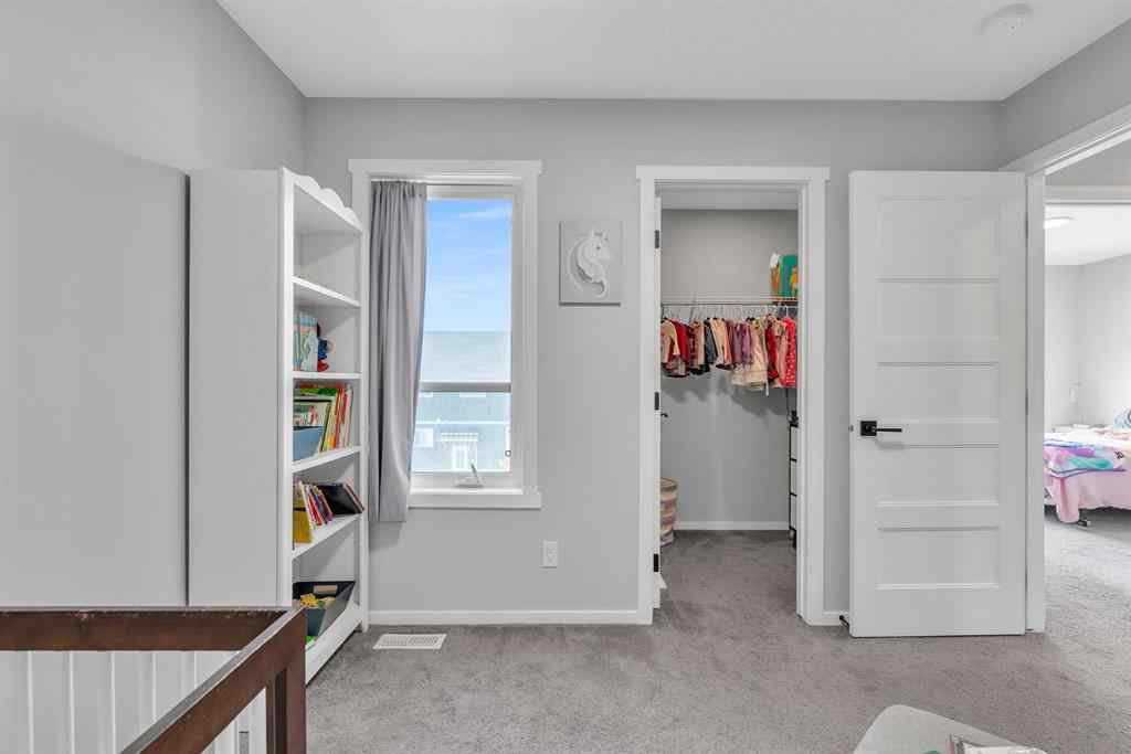 MLS® A2262302 - 98 Lucas Crescent NW in Livingston Calgary, Residential