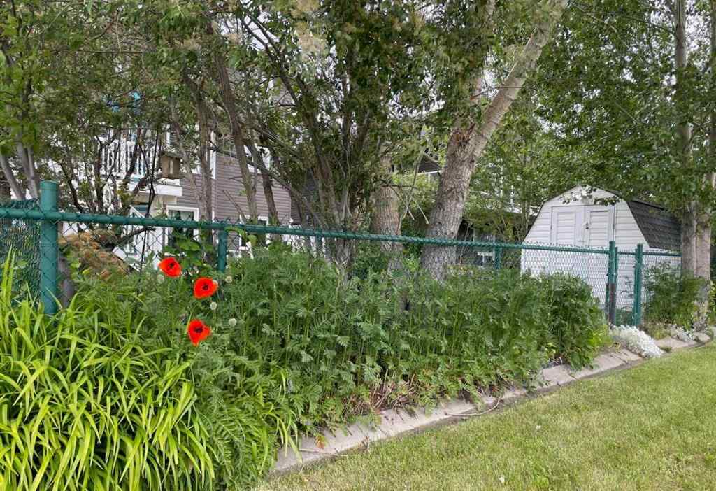 MLS® A2262309 - 2423 Morris Crescent SE in Meadowbrook Airdrie, Residential