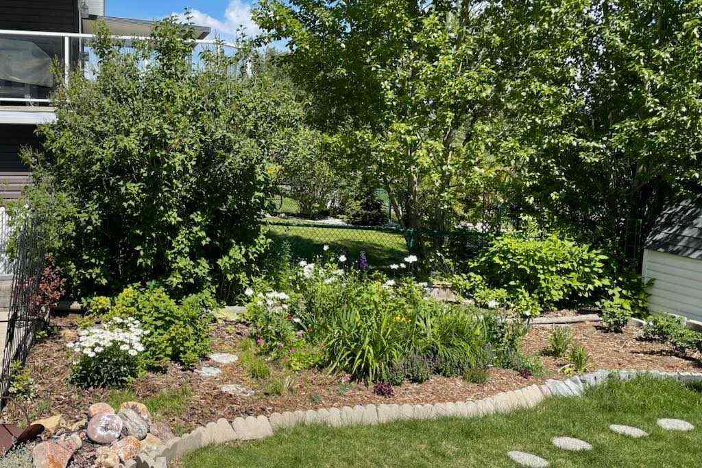 MLS® A2262309 - 2423 Morris Crescent SE in Meadowbrook Airdrie, Residential