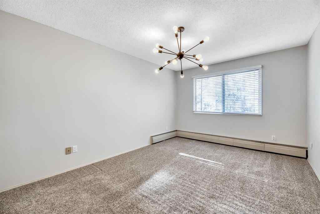 MLS® A2262312 - Unit #11 821 3 Avenue SW in Downtown Commercial Core Calgary, Residential