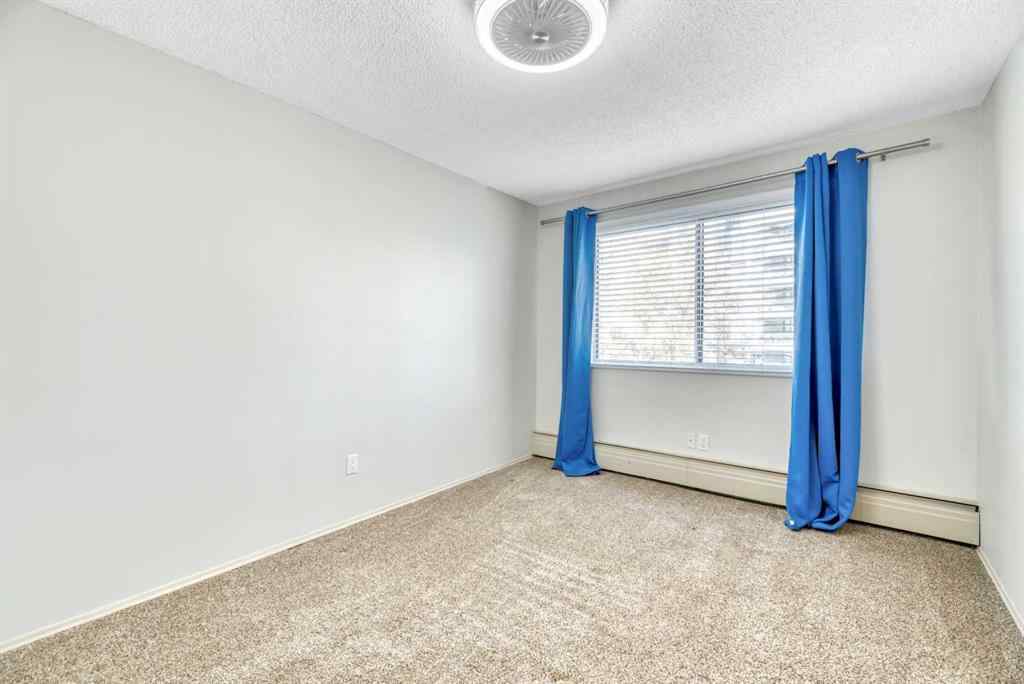 MLS® A2262312 - Unit #11 821 3 Avenue SW in Downtown Commercial Core Calgary, Residential