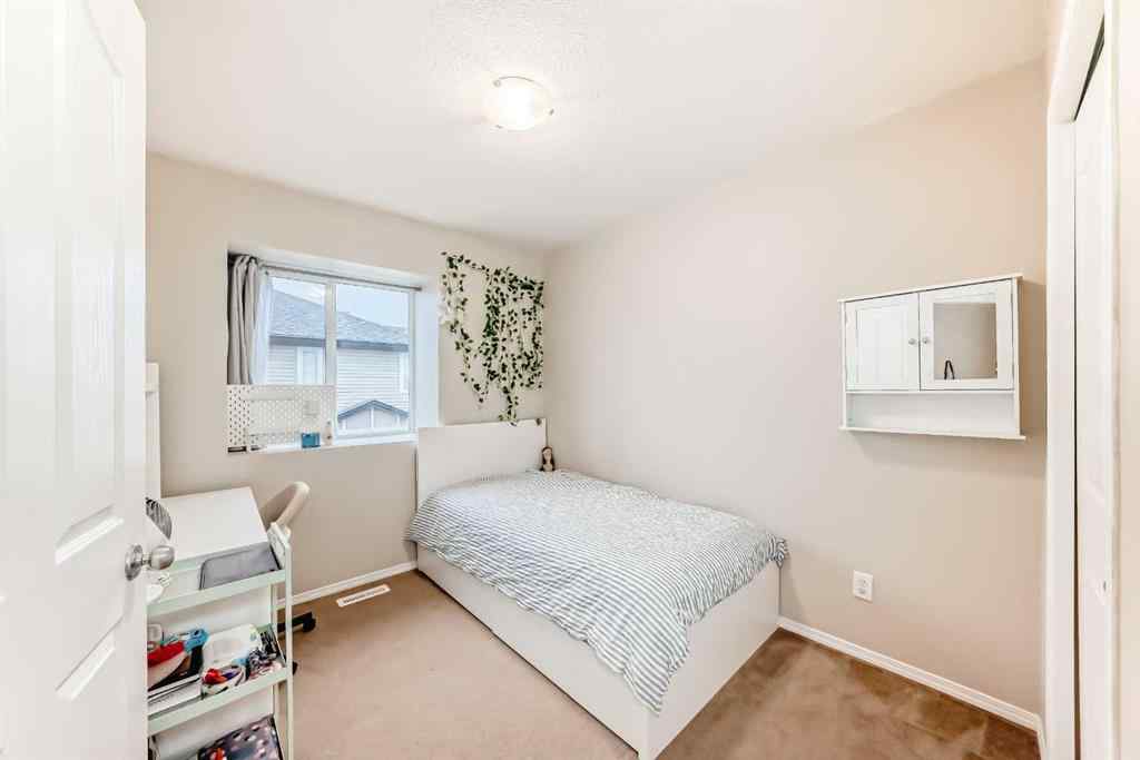 MLS® A2262313 - Unit #402 2066 Luxstone Boulevard SW in Luxstone Airdrie, Residential