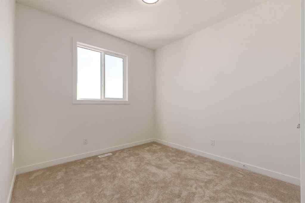 MLS® A2262319 - 1173 Iron Ridge Avenue  in NONE Crossfield, Residential