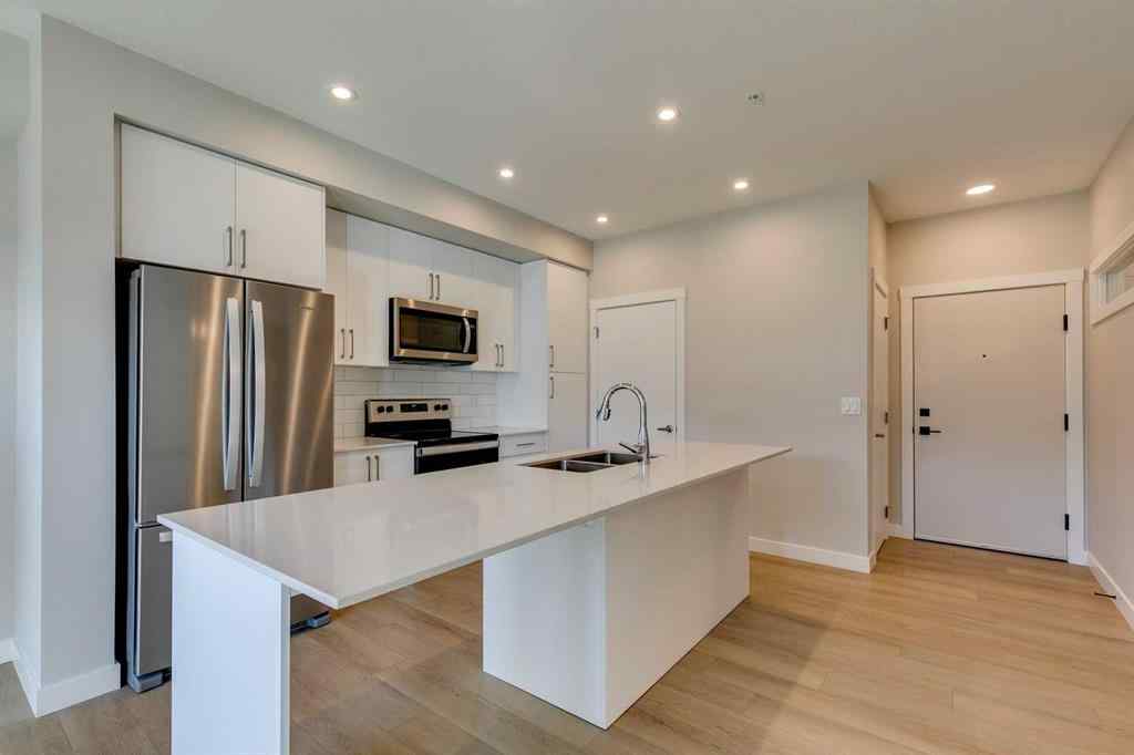 MLS® A2262345 - Unit #2202 100 Banister Drive  in Wedderburn Okotoks, Residential