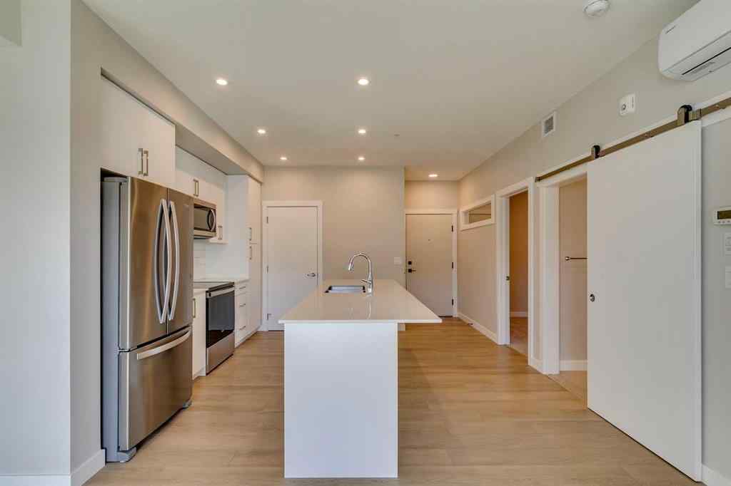 MLS® A2262345 - Unit #2202 100 Banister Drive  in Wedderburn Okotoks, Residential