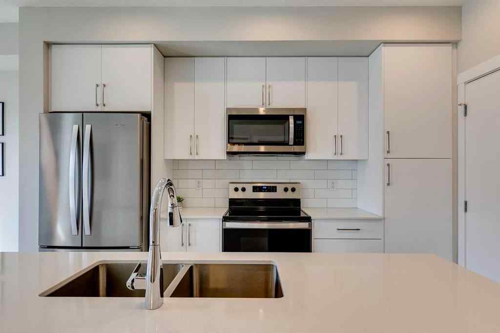 MLS® A2262345 - Unit #2202 100 Banister Drive  in Wedderburn Okotoks, Residential