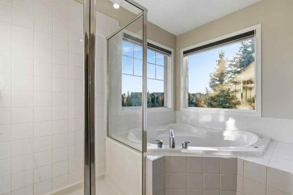 MLS® A2262348 - 64 Cougarstone Square SW in Cougar Ridge Calgary, Residential