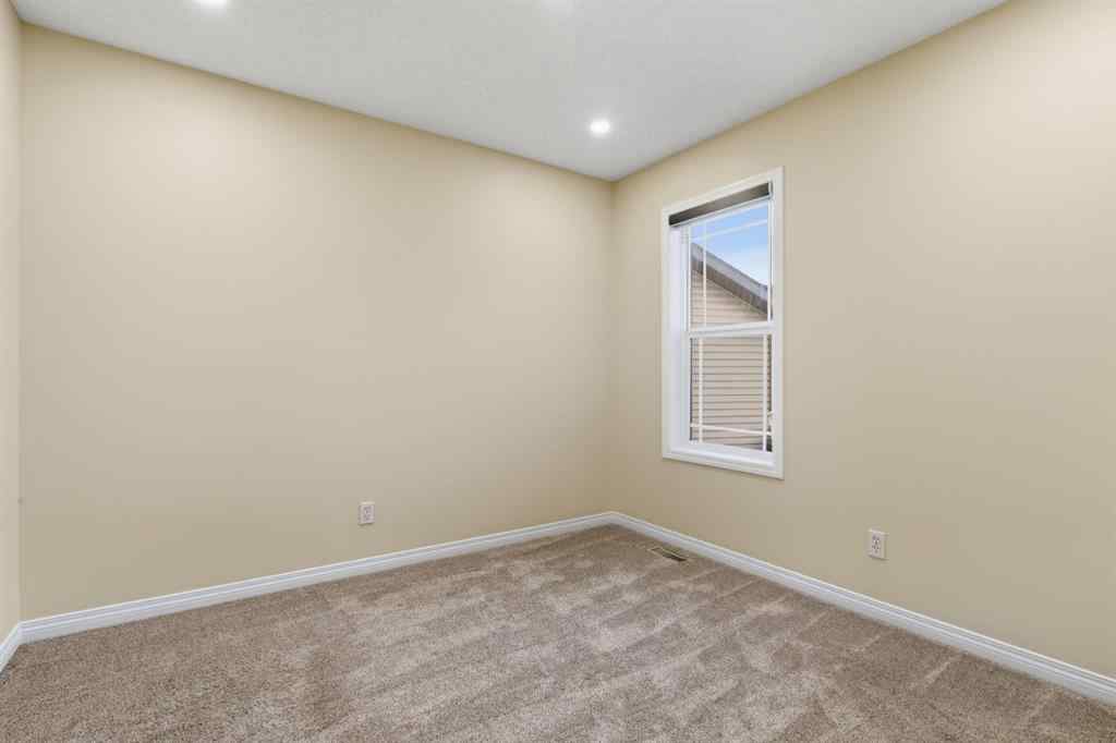 MLS® A2262348 - 64 Cougarstone Square SW in Cougar Ridge Calgary, Residential