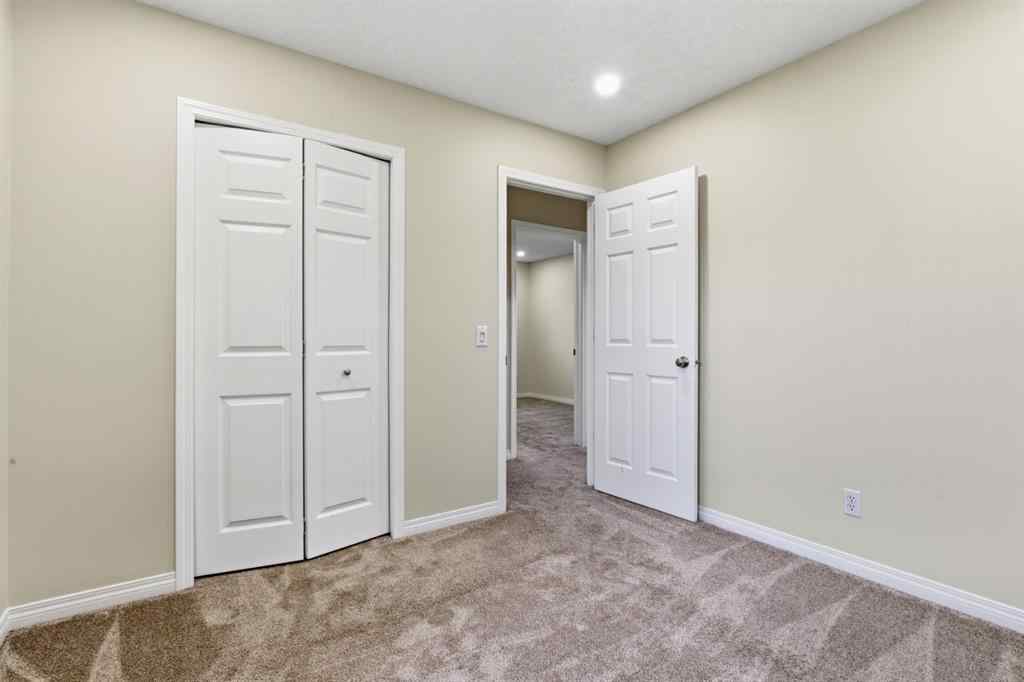 MLS® A2262348 - 64 Cougarstone Square SW in Cougar Ridge Calgary, Residential