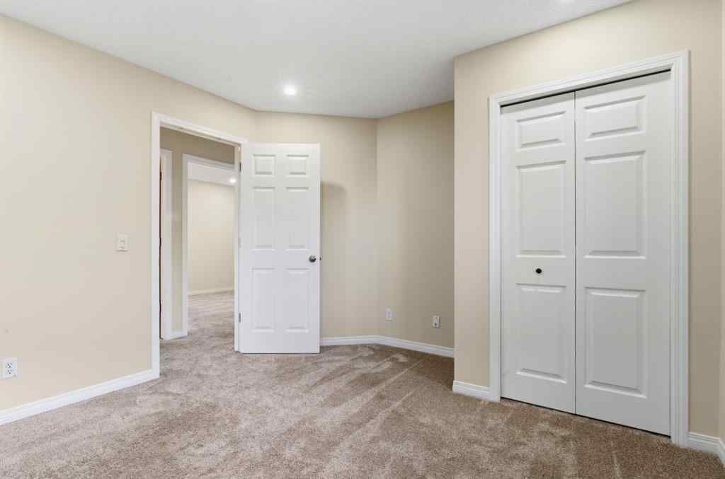 MLS® A2262348 - 64 Cougarstone Square SW in Cougar Ridge Calgary, Residential