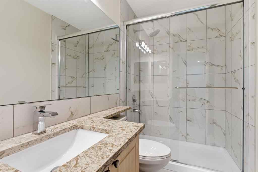 MLS® A2262348 - 64 Cougarstone Square SW in Cougar Ridge Calgary, Residential