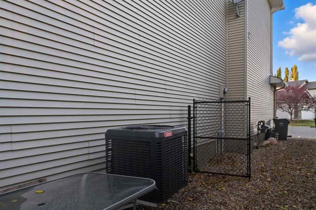 MLS® A2262348 - 64 Cougarstone Square SW in Cougar Ridge Calgary, Residential