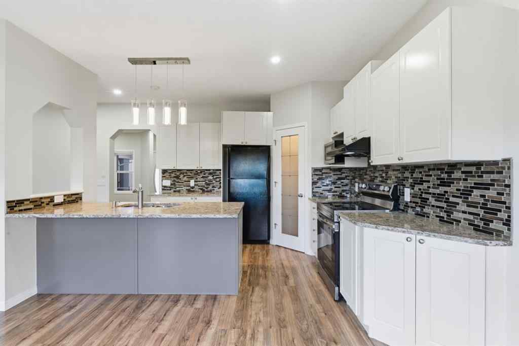 MLS® A2262348 - 64 Cougarstone Square SW in Cougar Ridge Calgary, Residential