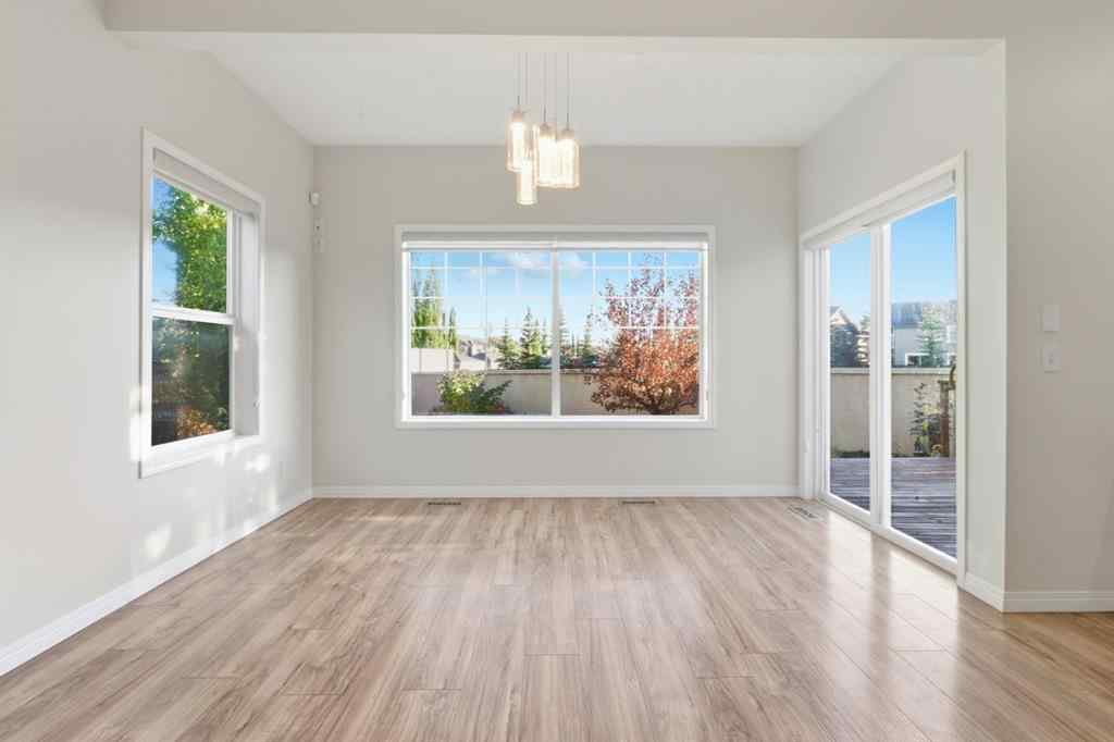 MLS® A2262348 - 64 Cougarstone Square SW in Cougar Ridge Calgary, Residential