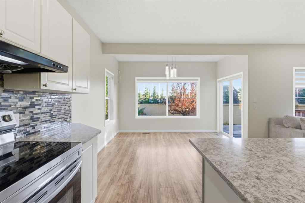 MLS® A2262348 - 64 Cougarstone Square SW in Cougar Ridge Calgary, Residential