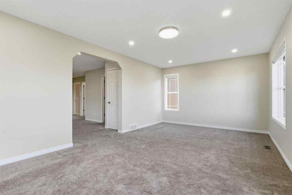 MLS® A2262348 - 64 Cougarstone Square SW in Cougar Ridge Calgary, Residential