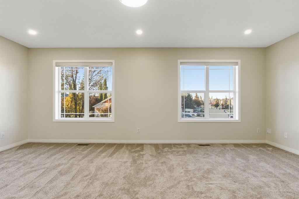 MLS® A2262348 - 64 Cougarstone Square SW in Cougar Ridge Calgary, Residential