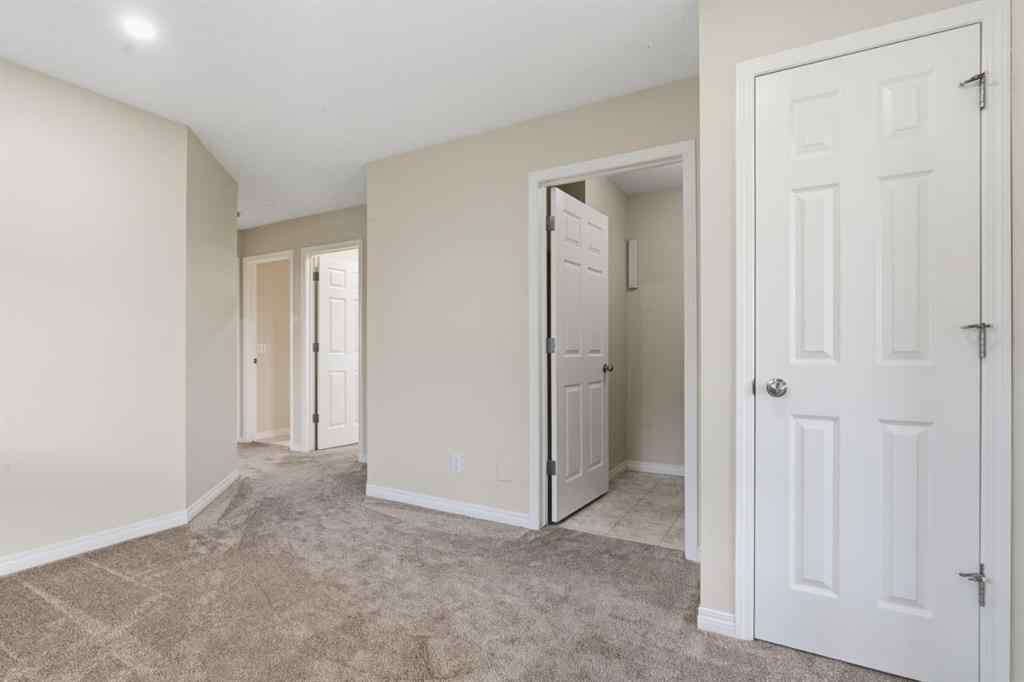 MLS® A2262348 - 64 Cougarstone Square SW in Cougar Ridge Calgary, Residential