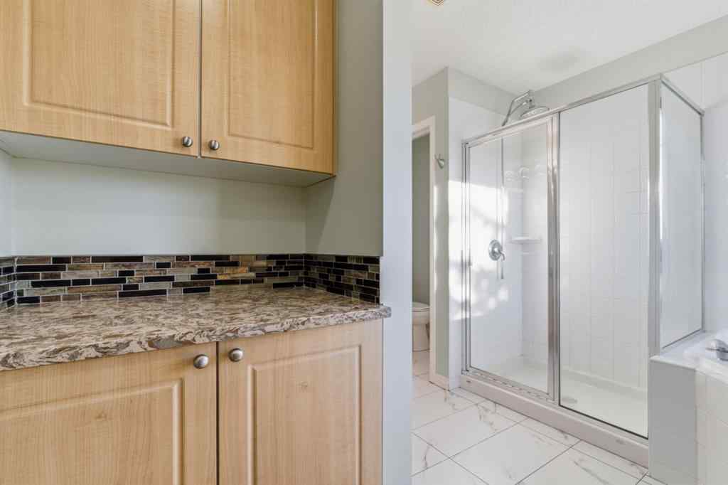 MLS® A2262348 - 64 Cougarstone Square SW in Cougar Ridge Calgary, Residential