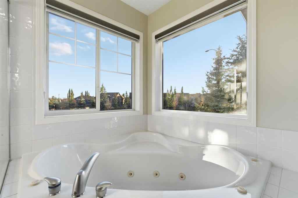 MLS® A2262348 - 64 Cougarstone Square SW in Cougar Ridge Calgary, Residential