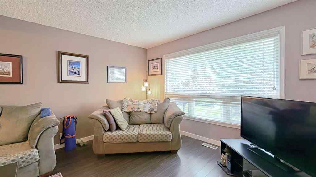 MLS® A2262352 - 135 Woodsman Lane SW in Woodbine Calgary, Residential