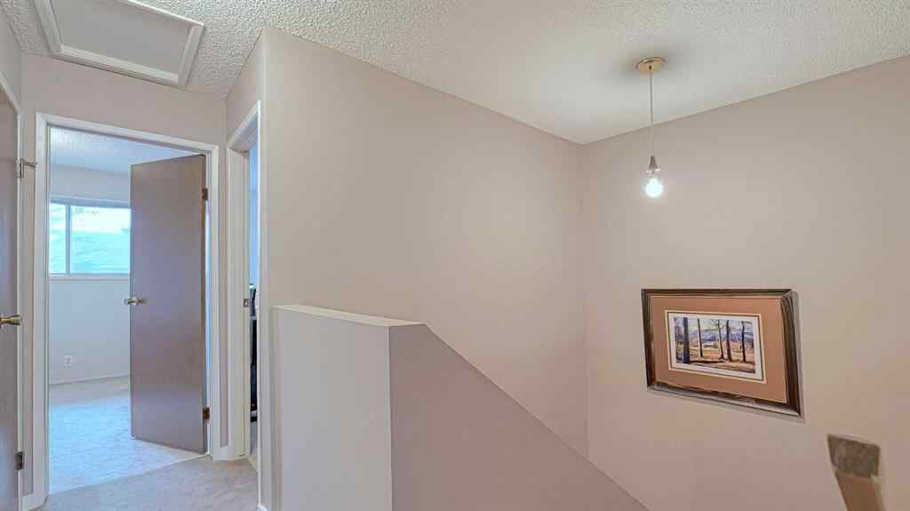 MLS® A2262352 - 135 Woodsman Lane SW in Woodbine Calgary, Residential