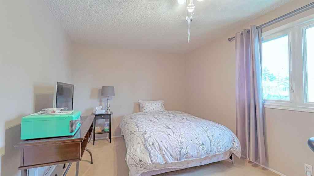 MLS® A2262352 - 135 Woodsman Lane SW in Woodbine Calgary, Residential