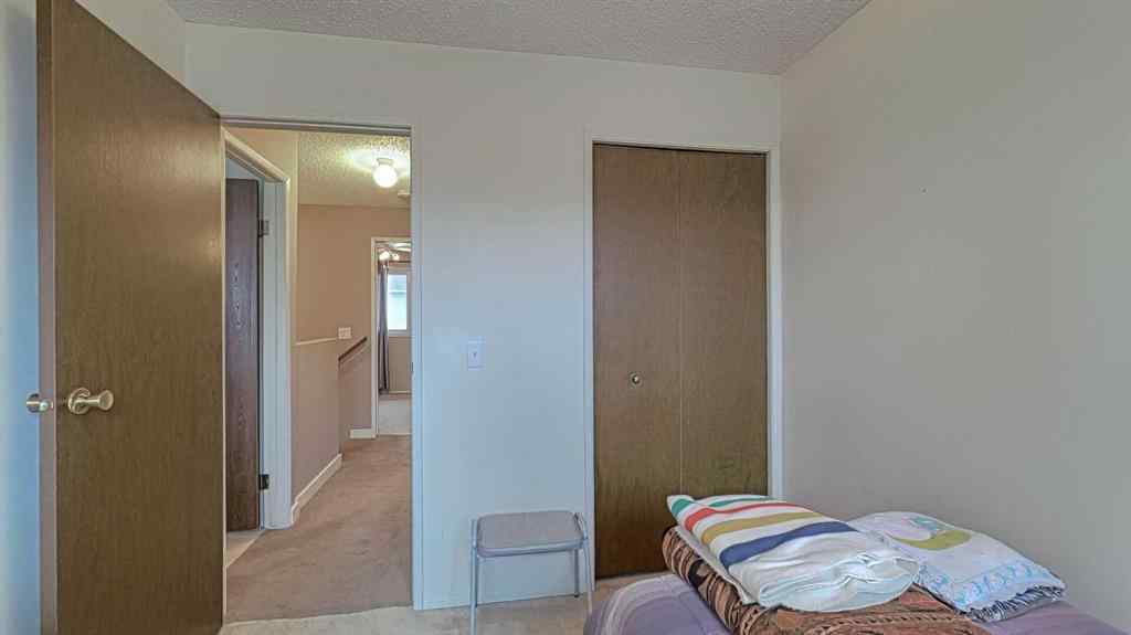 MLS® A2262352 - 135 Woodsman Lane SW in Woodbine Calgary, Residential