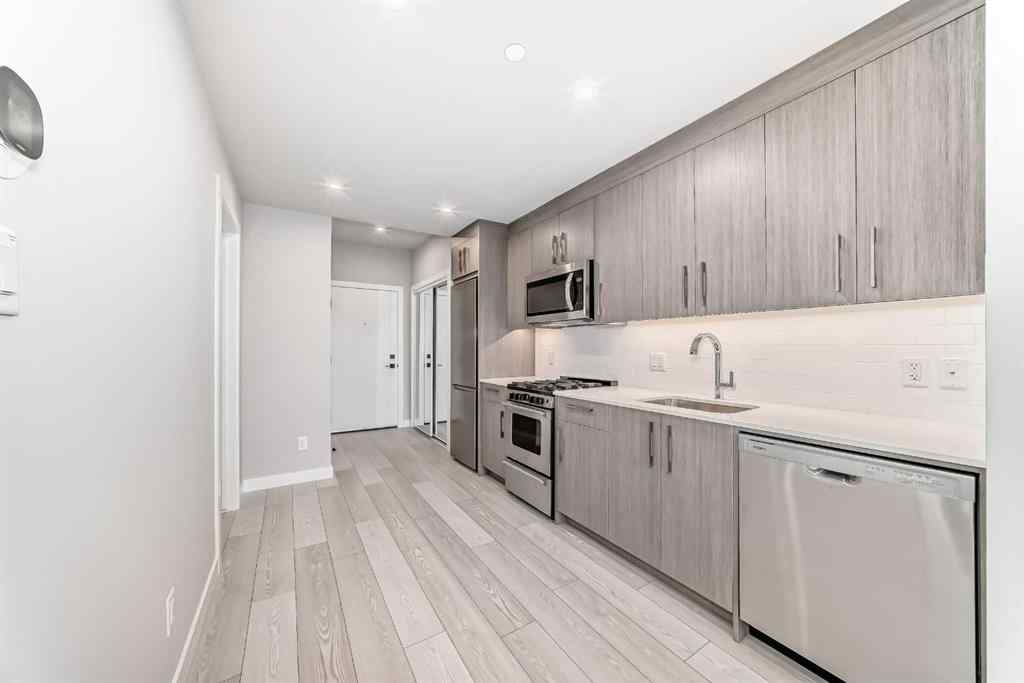 MLS® A2262357 - Unit #206 110 18a street nw   in West Hillhurst Calgary, Residential