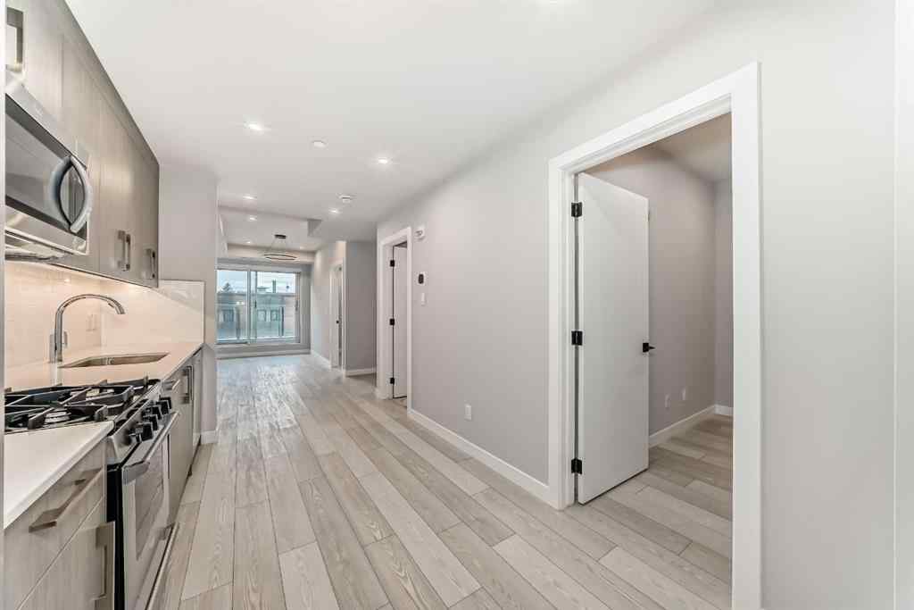 MLS® A2262357 - Unit #206 110 18a street nw   in West Hillhurst Calgary, Residential