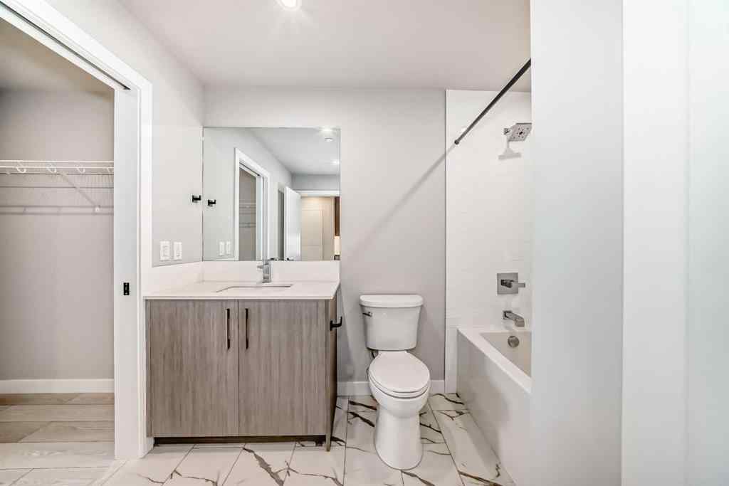 MLS® A2262357 - Unit #206 110 18a street nw   in West Hillhurst Calgary, Residential