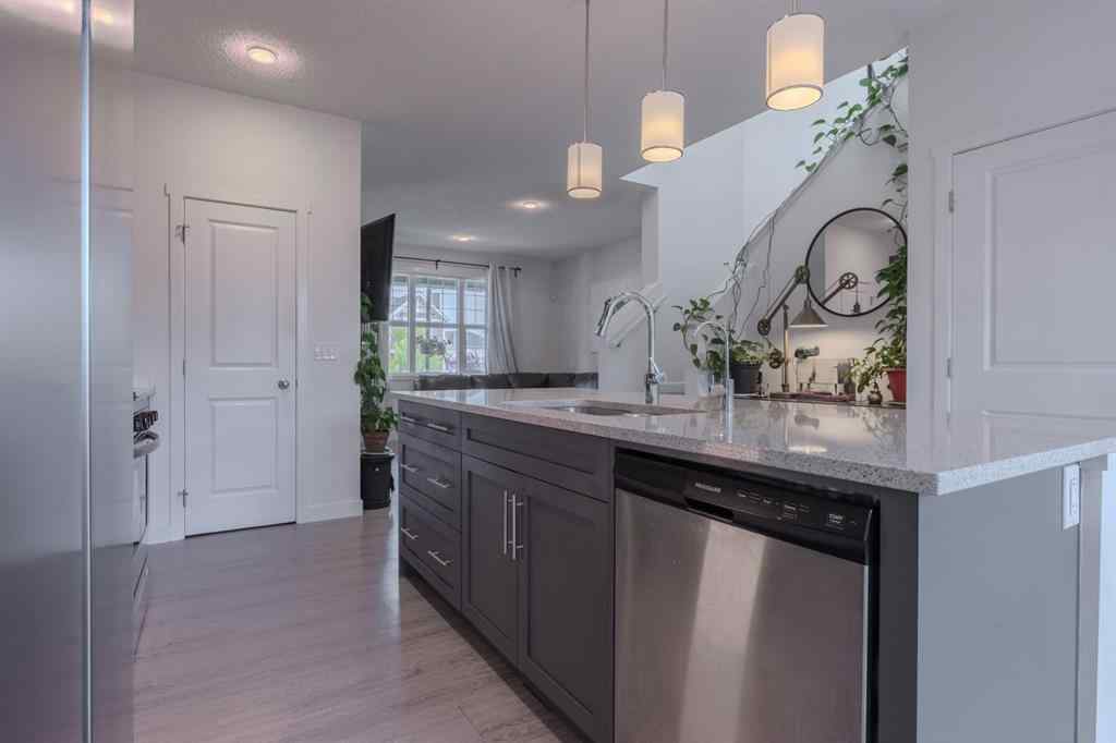 MLS® A2262360 - 239 Sundown Road  in Sunset Ridge Cochrane, Residential